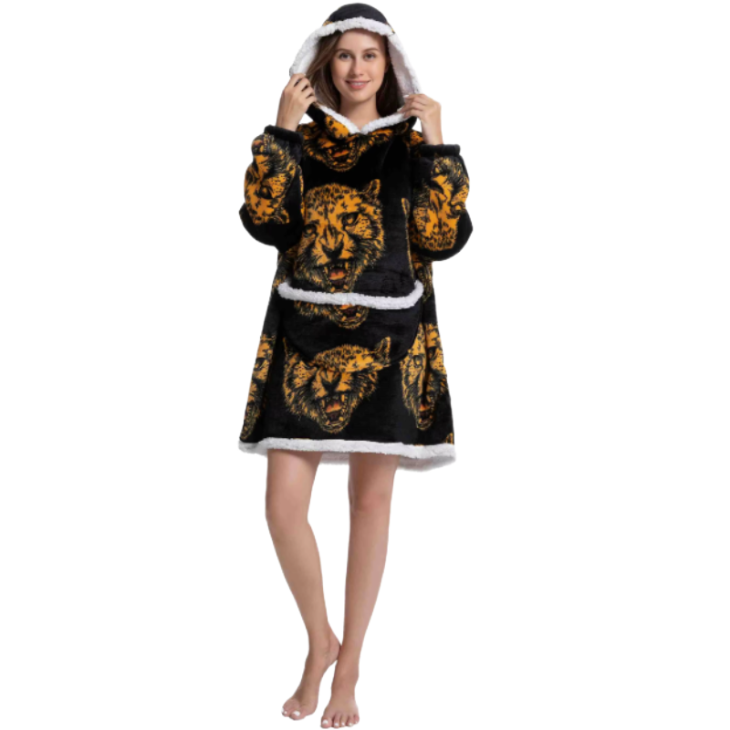 Woman wearing a black and yellow leopard patterned hoodie on a white background