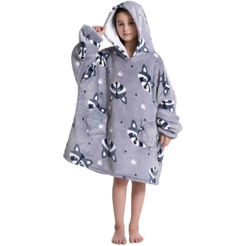 Child wearing grey oversized wearable hoodie featuring a playful raccoon print.