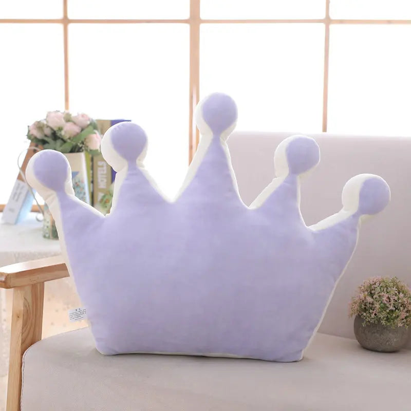 Light purple plush crown pillow styled as a soft bedroom cushion