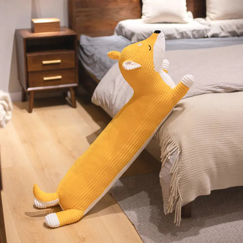 Yellow fox long body plush hug pillow with soft ribbed texture and relaxed pose