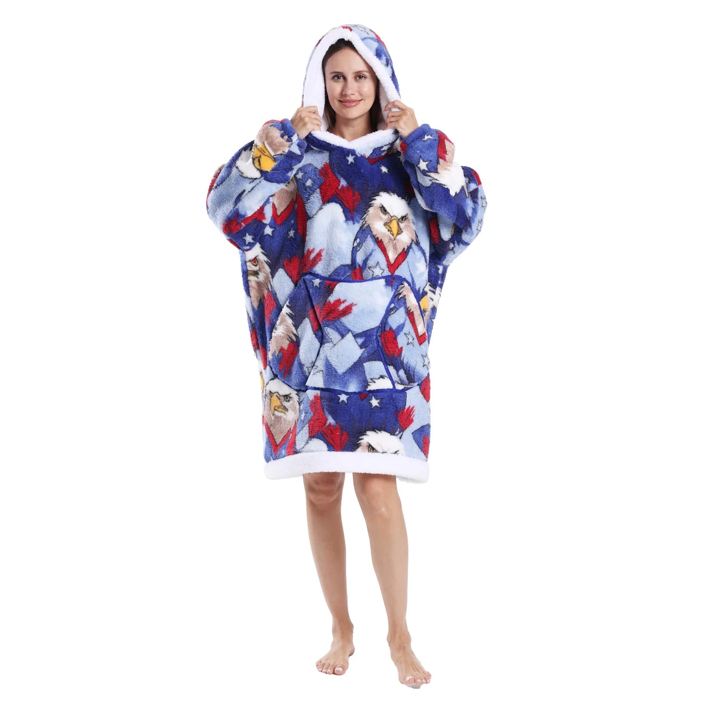 Woman wearing a colourful oversized lounge hoodie with eagle motifs on a white background