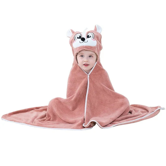 Child wearing a squirrel hooded towel on a white background