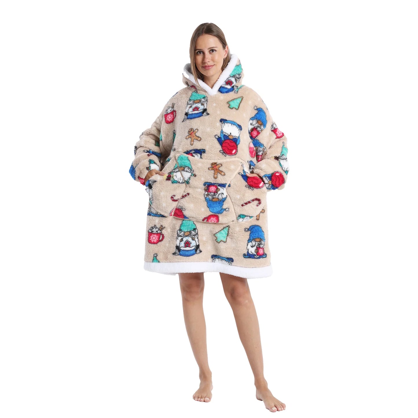 Woman wearing a khaki oversized Christmas themed hoodie with gonk and gingerbread men motifs