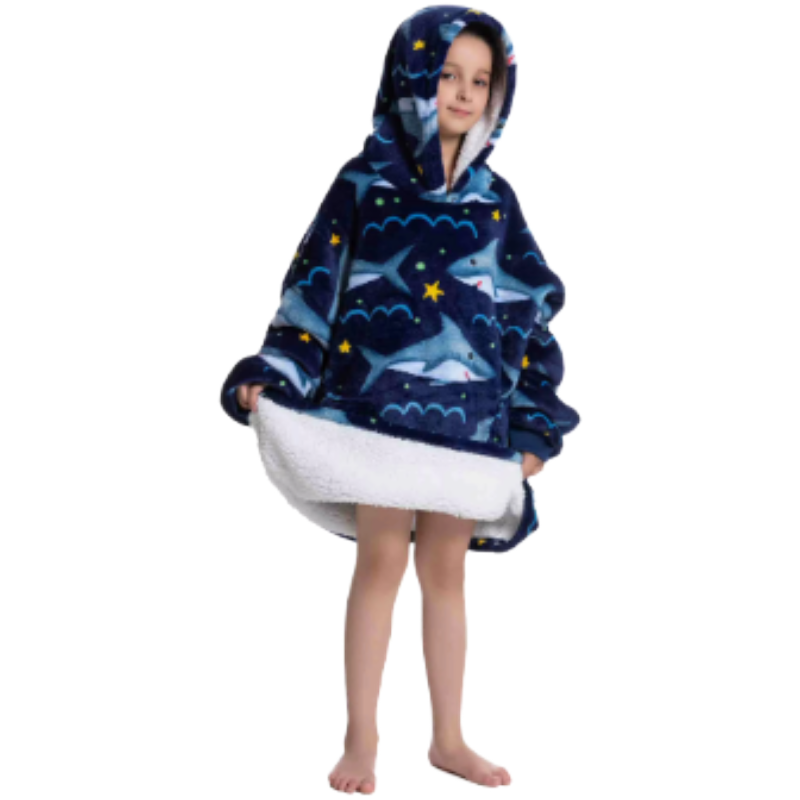 Child wearing a blue shark themed oversized lounge hoodie.