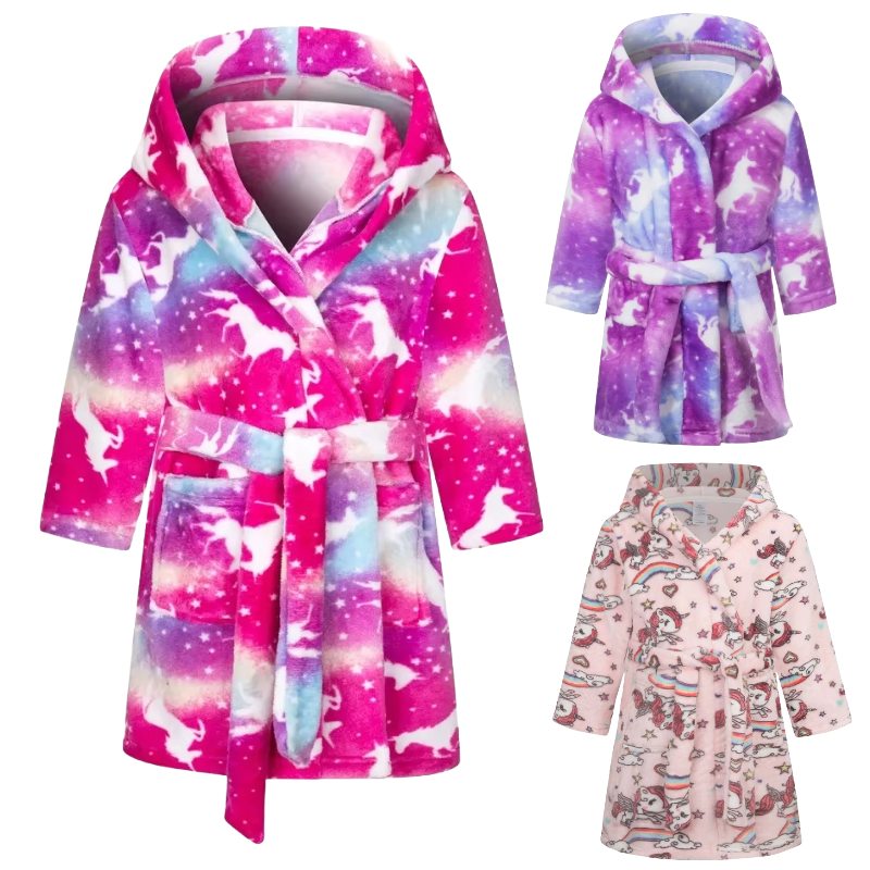 Three different unicorn design bath robes on a white background