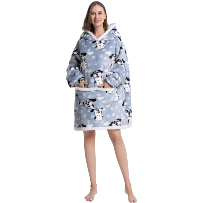 Woman wearing a happy dog blue oversized wearable hoodie on a white background.