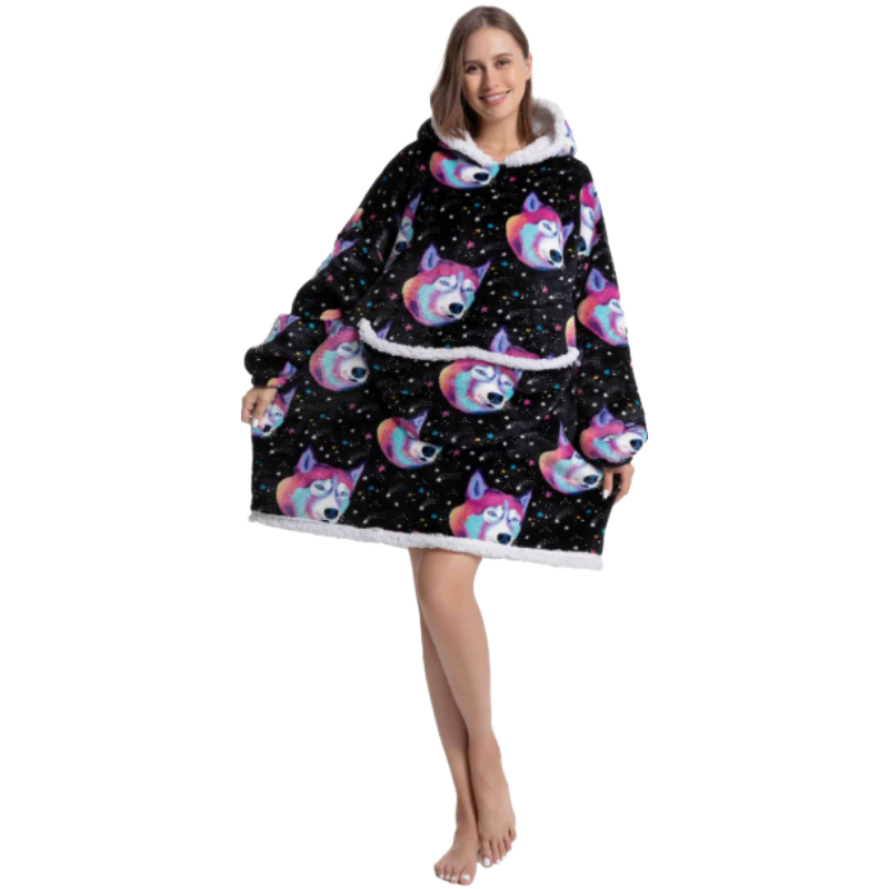 Adult wearing black oversized wearable hoodie with colourful wolf head print.
