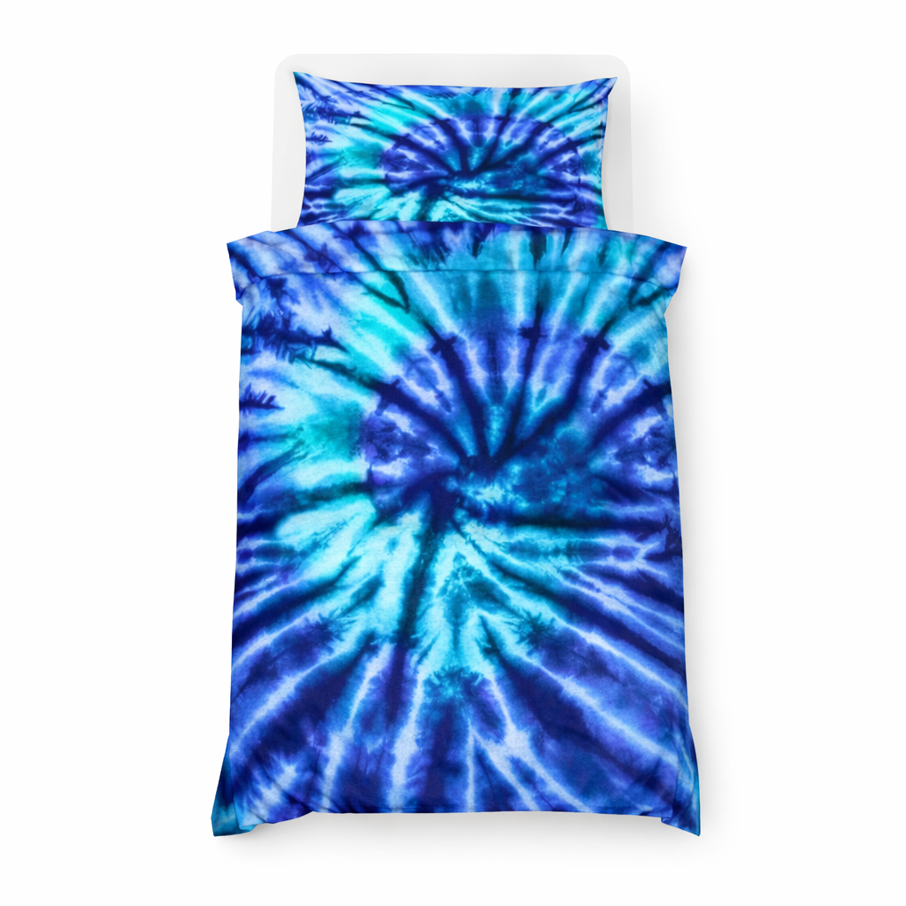 Tie-dye blue and purple bedding set on a white background