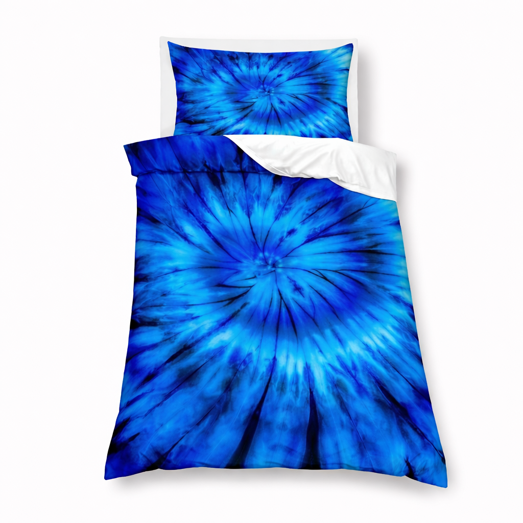 Blue tie-dye bedding set with a pillow on a white background