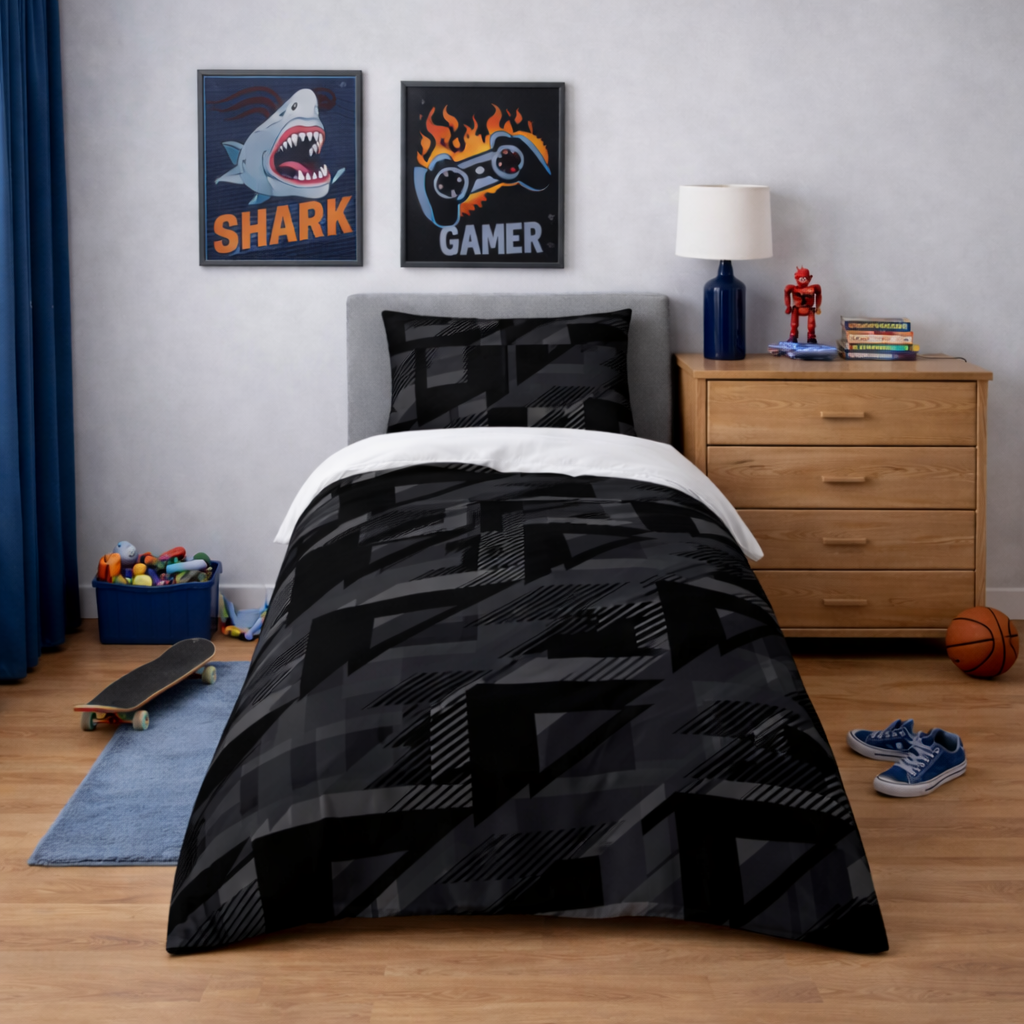 Bedroom with black bedding, wooden dresser, and posters on the wall.