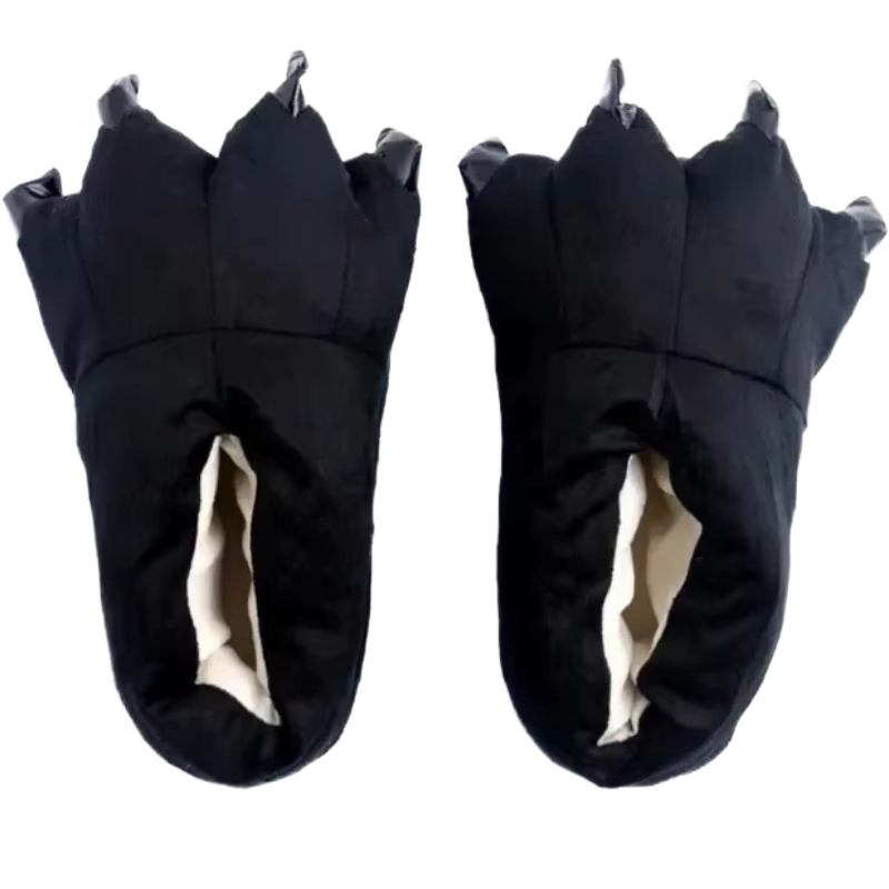 Black dinosaur claw shoes on a white background