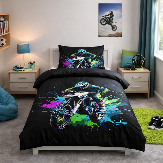 Black motocross rider duvet set with vibrant neon paint splash design displayed on a single bed with matching pillowcase