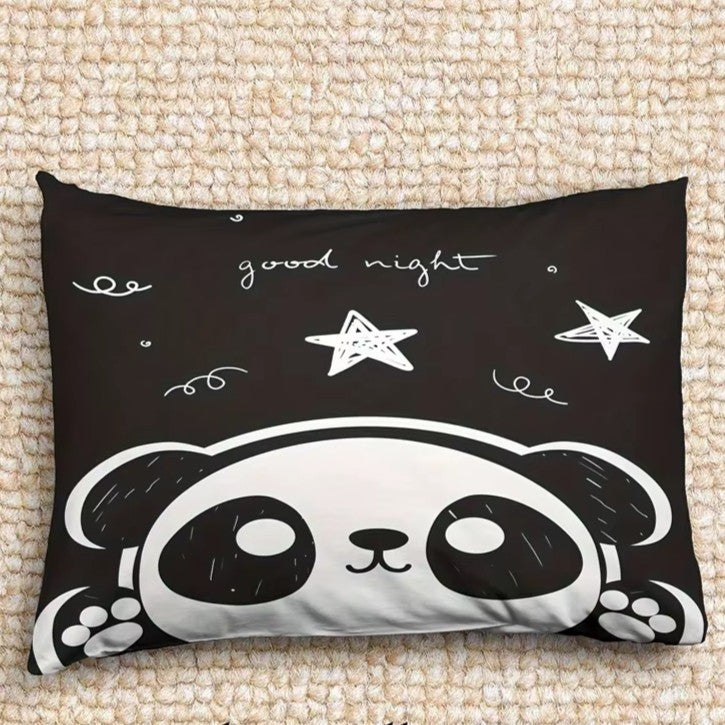 Pillow with panda design and 'good night' text on a textured surface