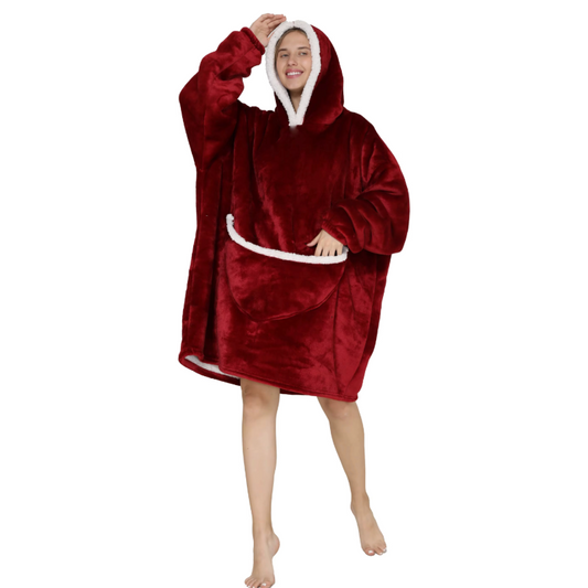 Dark red oversized wearable hoodie with hood and large front pocket, shown as a cosy pullover blanket-style design.