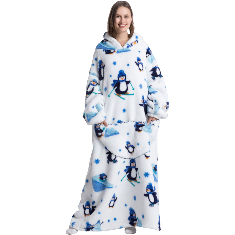 Person wearing a penguin-themed blanket with a hood on a white background