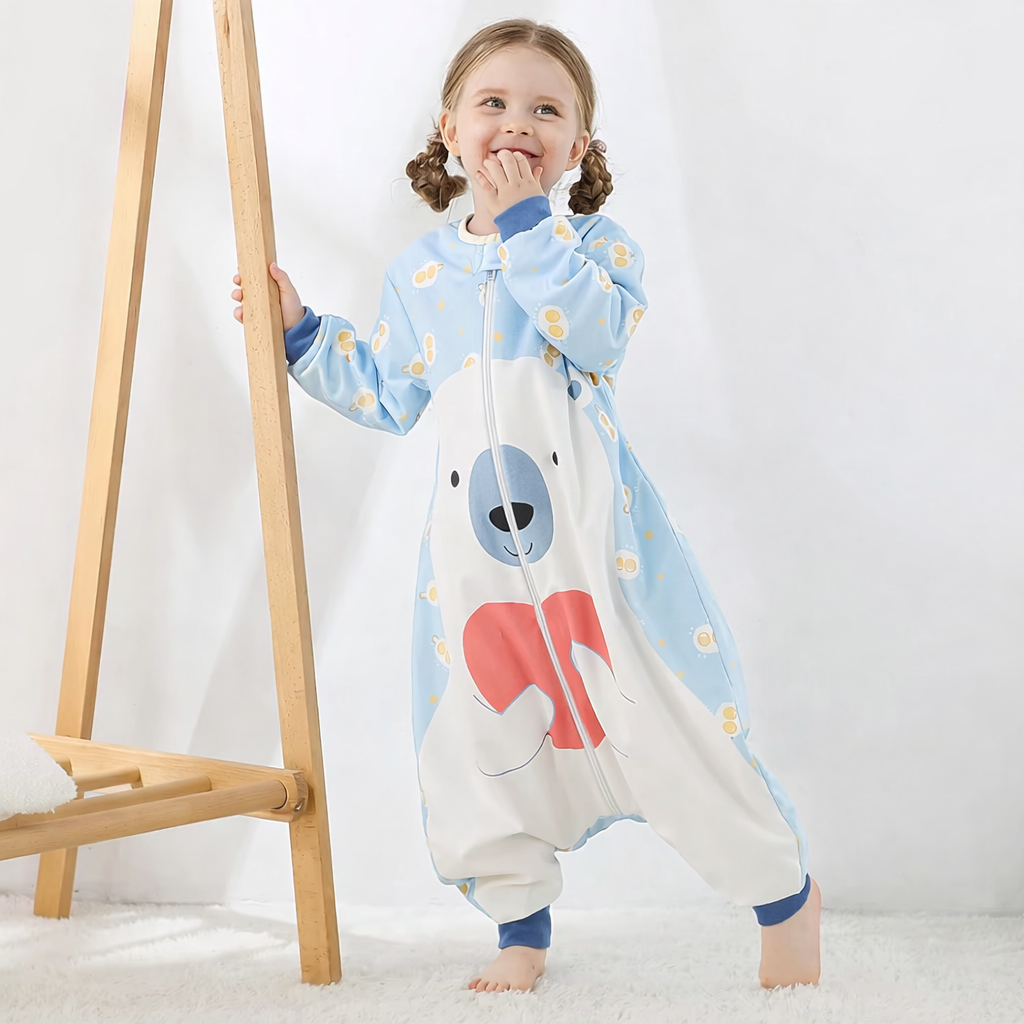 Blue polar bear fleece zip up children’s onesie with long sleeves and playful cartoon print