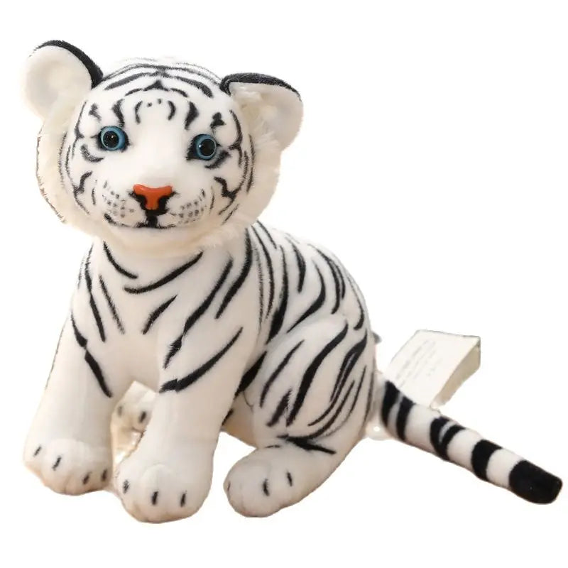 Plush toy of a white tiger cub on a white background