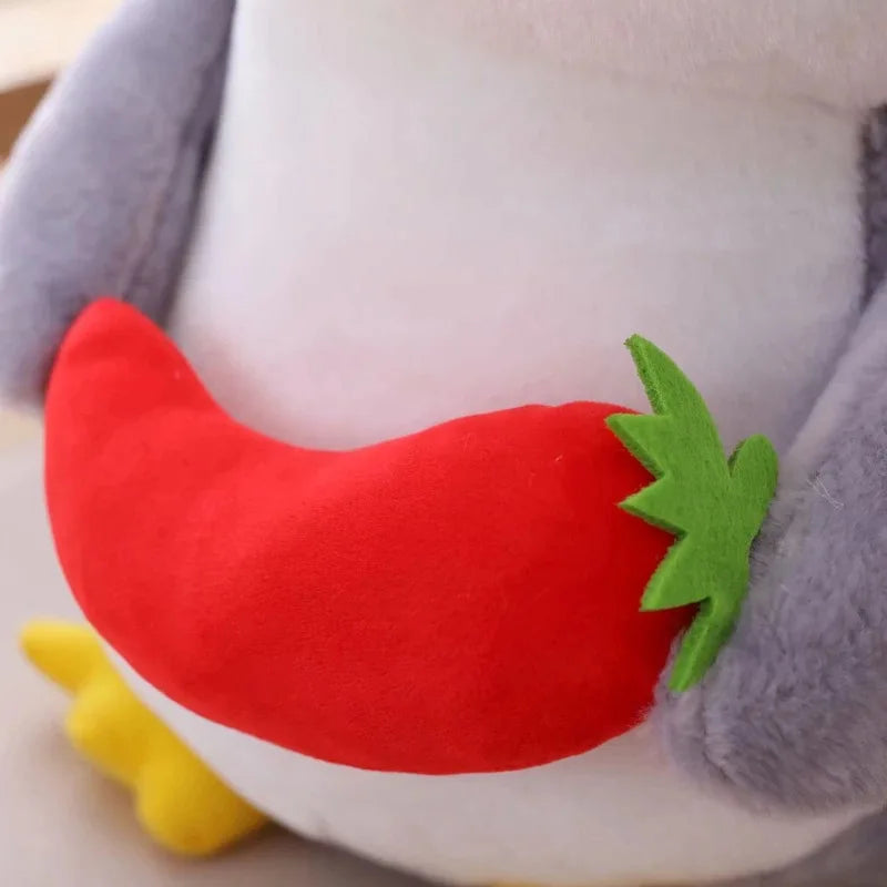 Plush toy with a red chili pepper design on a soft background
