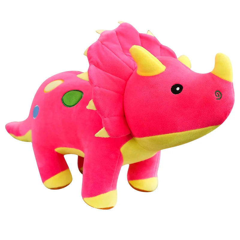 Pink dinosaur plush toy with yellow accents on a white background