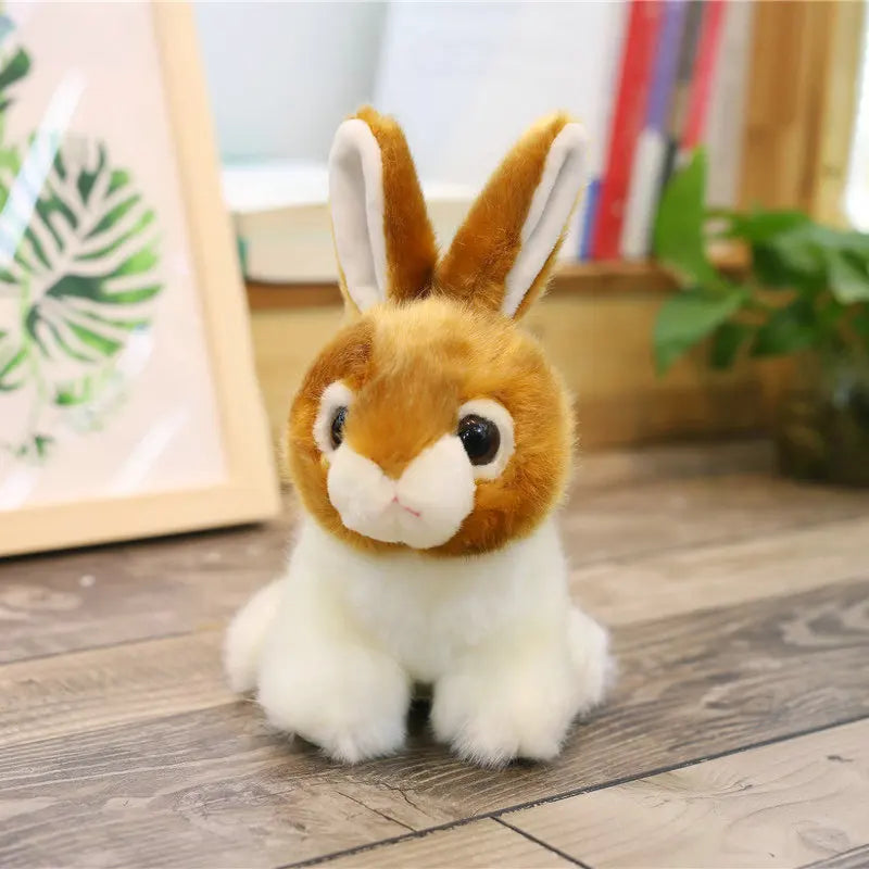 Plush rabbit toy on a wooden floor with a blurred indoor background