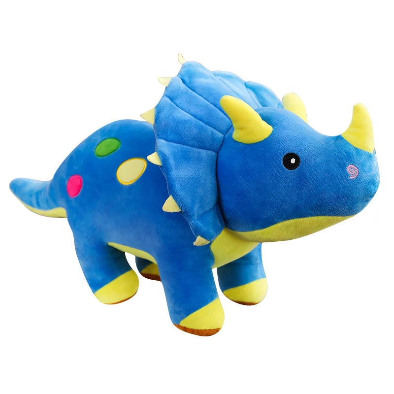 Blue and yellow plush dinosaur toy on a white background