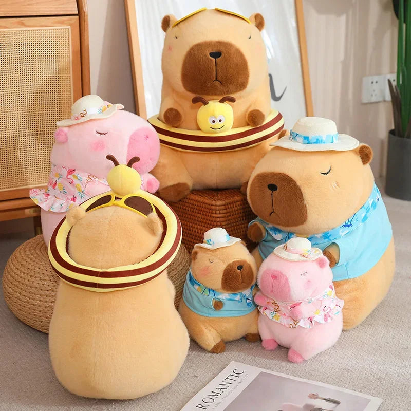 Set of Capybara soft plush toys in a living room setting.