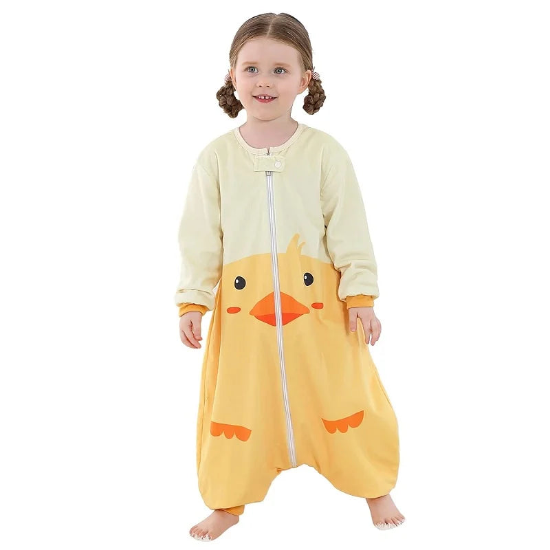 Child wearing a yellow duck-themed onesie on a white background