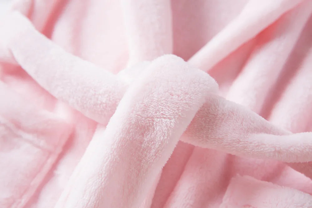 Close up of a pink nightgown's rope tie