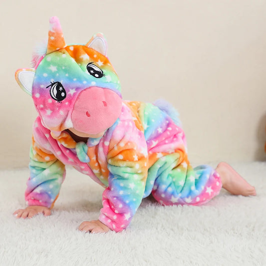 Child wearing rainbow unicorn baby romper with hooded design and zip front in soft flannel fabric