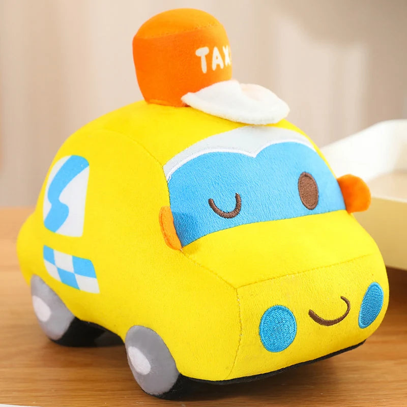 Yellow taxi cartoon car plush toy with smiling face and soft rounded design