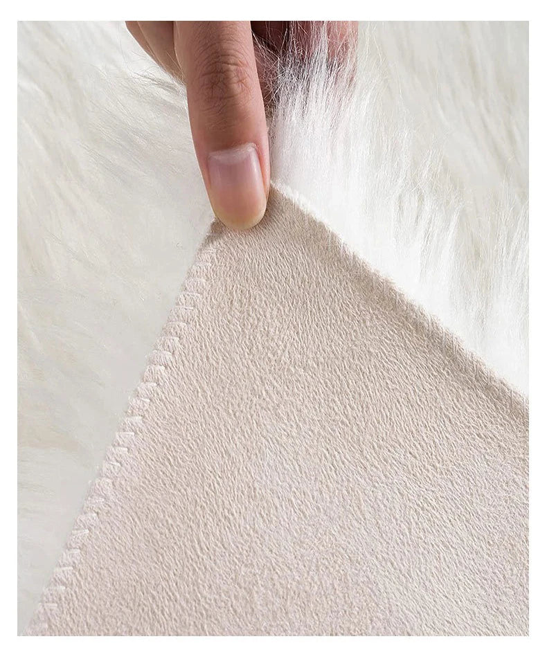 Close up of the back of a white rug