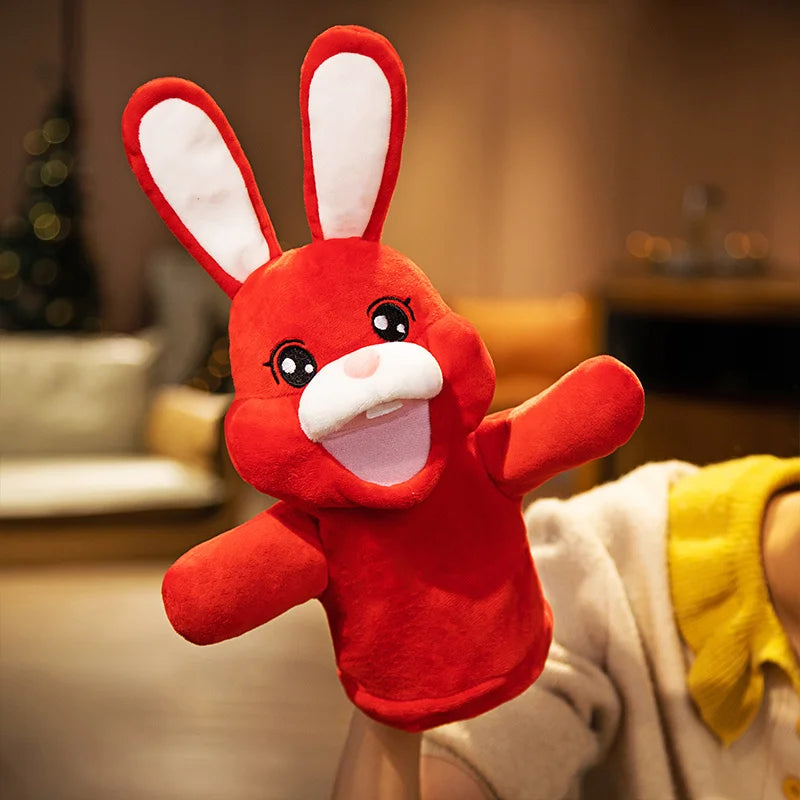 Red plush rabbit toy with white ears in a blurred indoor setting