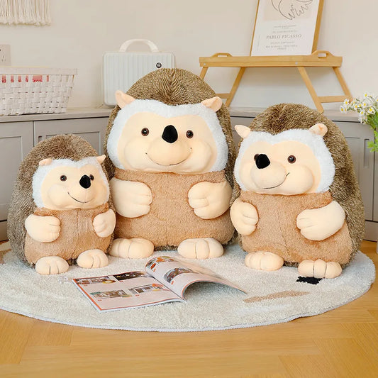 Three plush hedgehog toys on a rug, in a home setting.