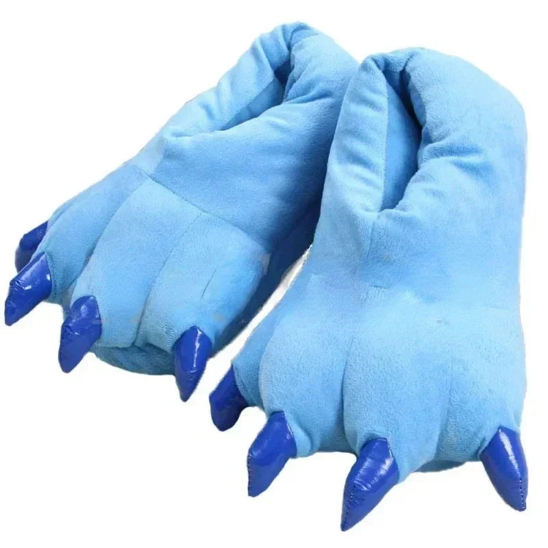 Blue paw-shaped slippers with claw-like nails on a white background