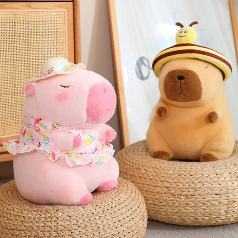 Two plush toys, one pink and one brown, sitting on woven stools.