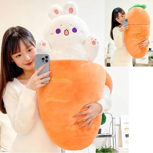 Person holding a large plush carrot toy with a cartoon rabbit on a white background