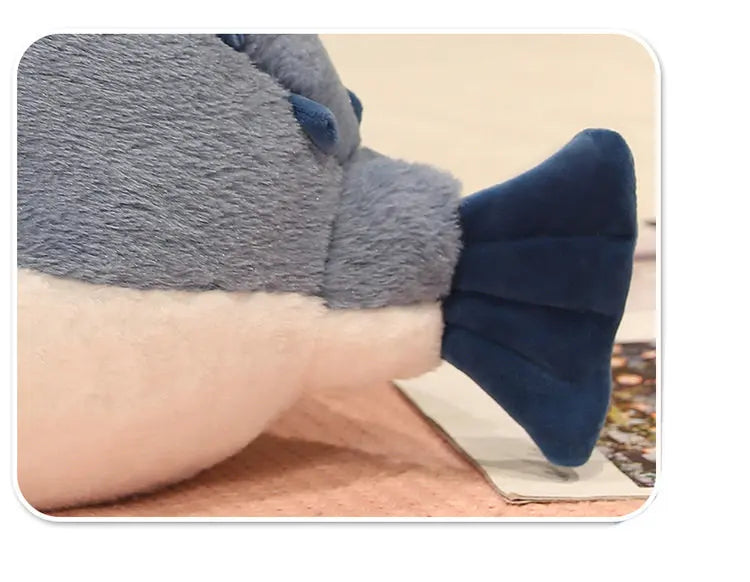 Close up of a plush pufferfish toys detailing of the tail. 