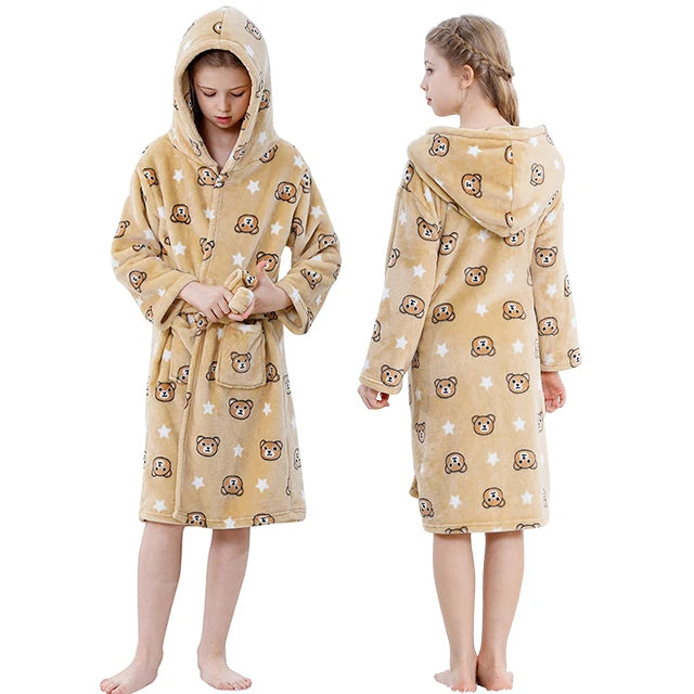 Brown bear-themed robe worn by a child on a white background