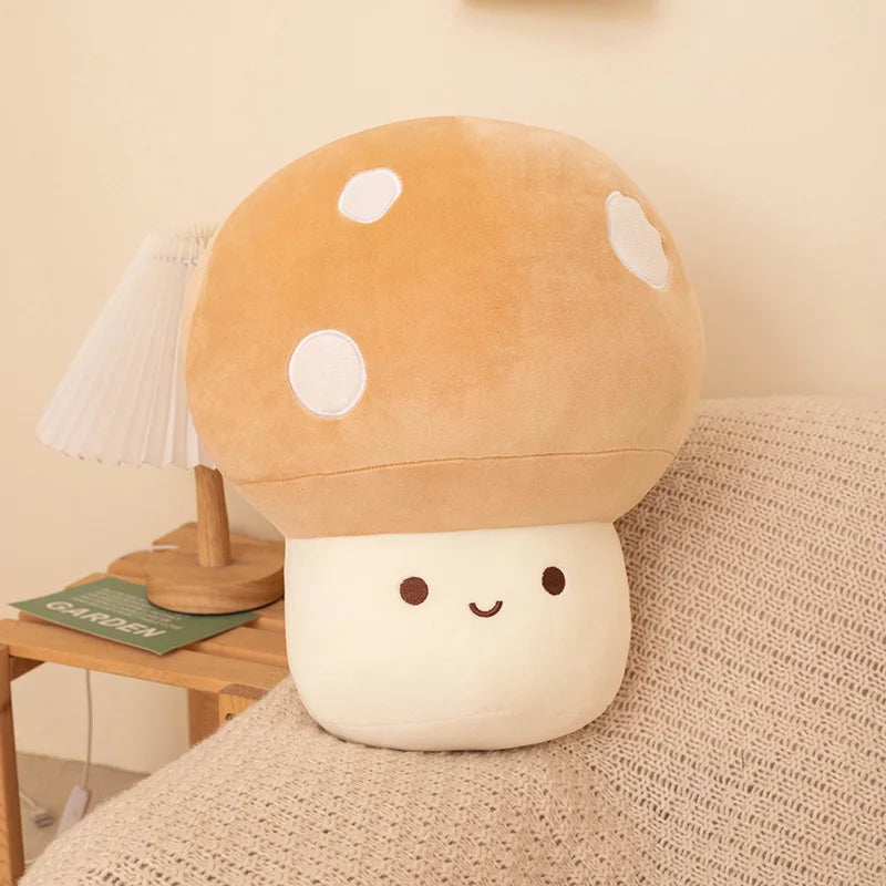 Brown soft plush mushroom toy on a soft surface.