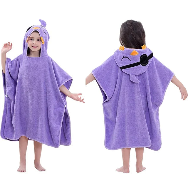Purple cartoon-themed hooded towel worn by a child on a white background