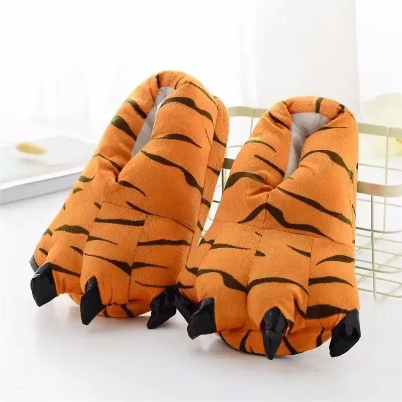 Pair of tiger-striped slippers on a white background