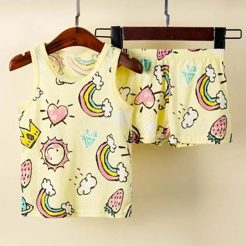 Yellow vest and short pyjama set with rainbow and sunshine patterns