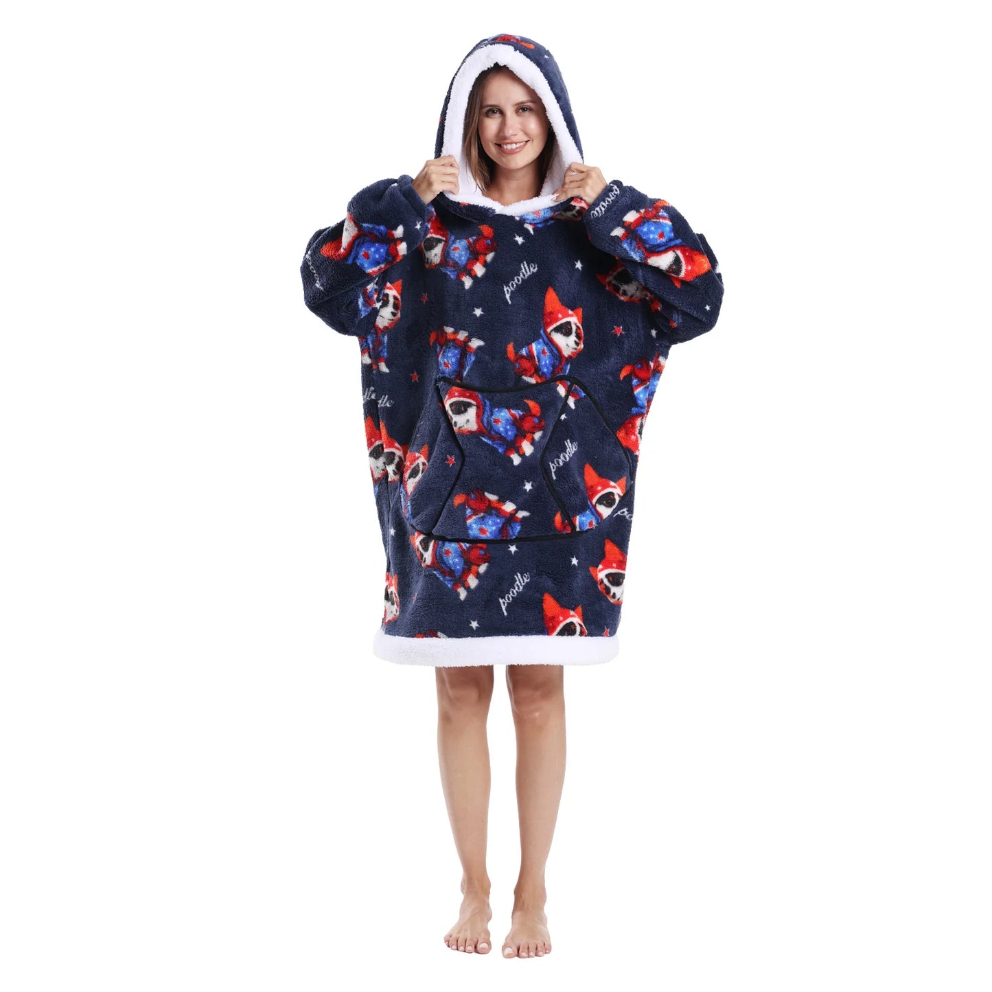Woman wearing a navy oversized Christmas themed hoodie with Christmas poodle motifs