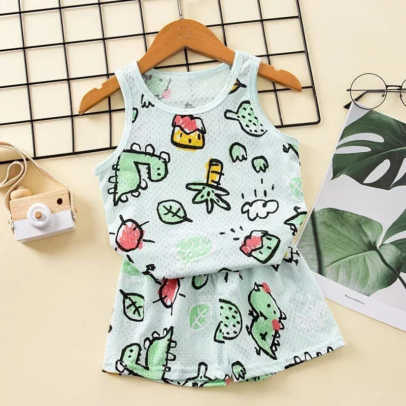 Green vest and shorts pyjama set with a fun dinosaur print