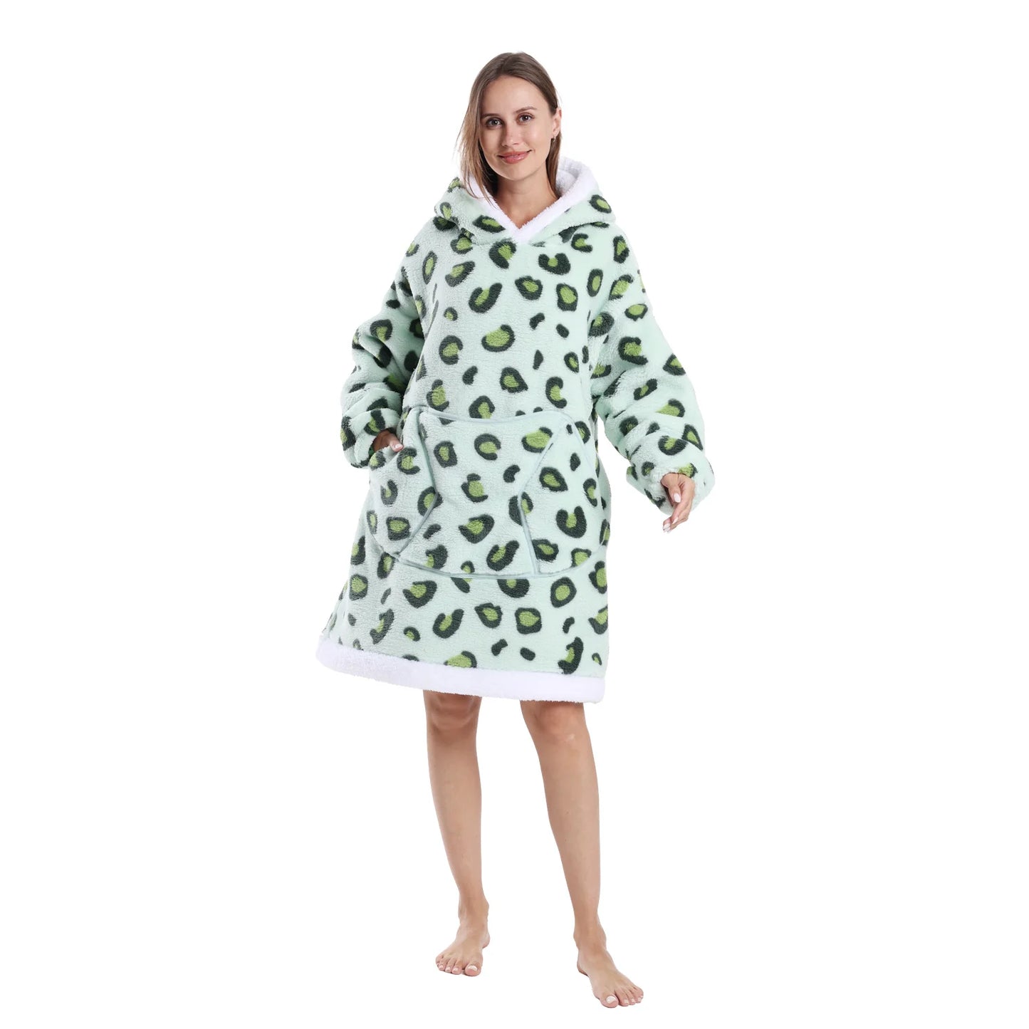 Animal print fleece wearable blanket hoodie shown in green with hooded oversized fit for lounging