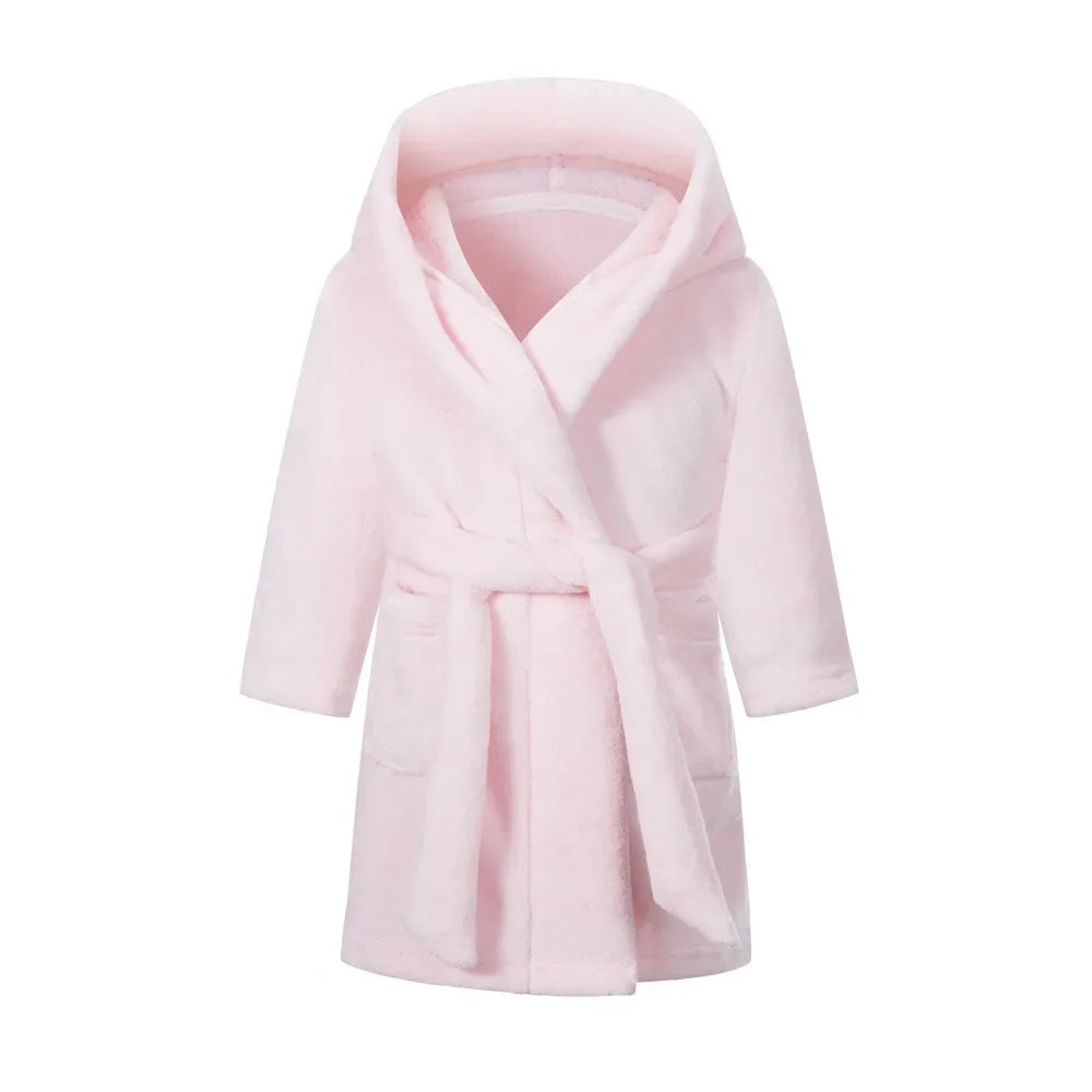 Kids soft hooded bathrobe nightgown in pale blush pink with rope tie fastening.