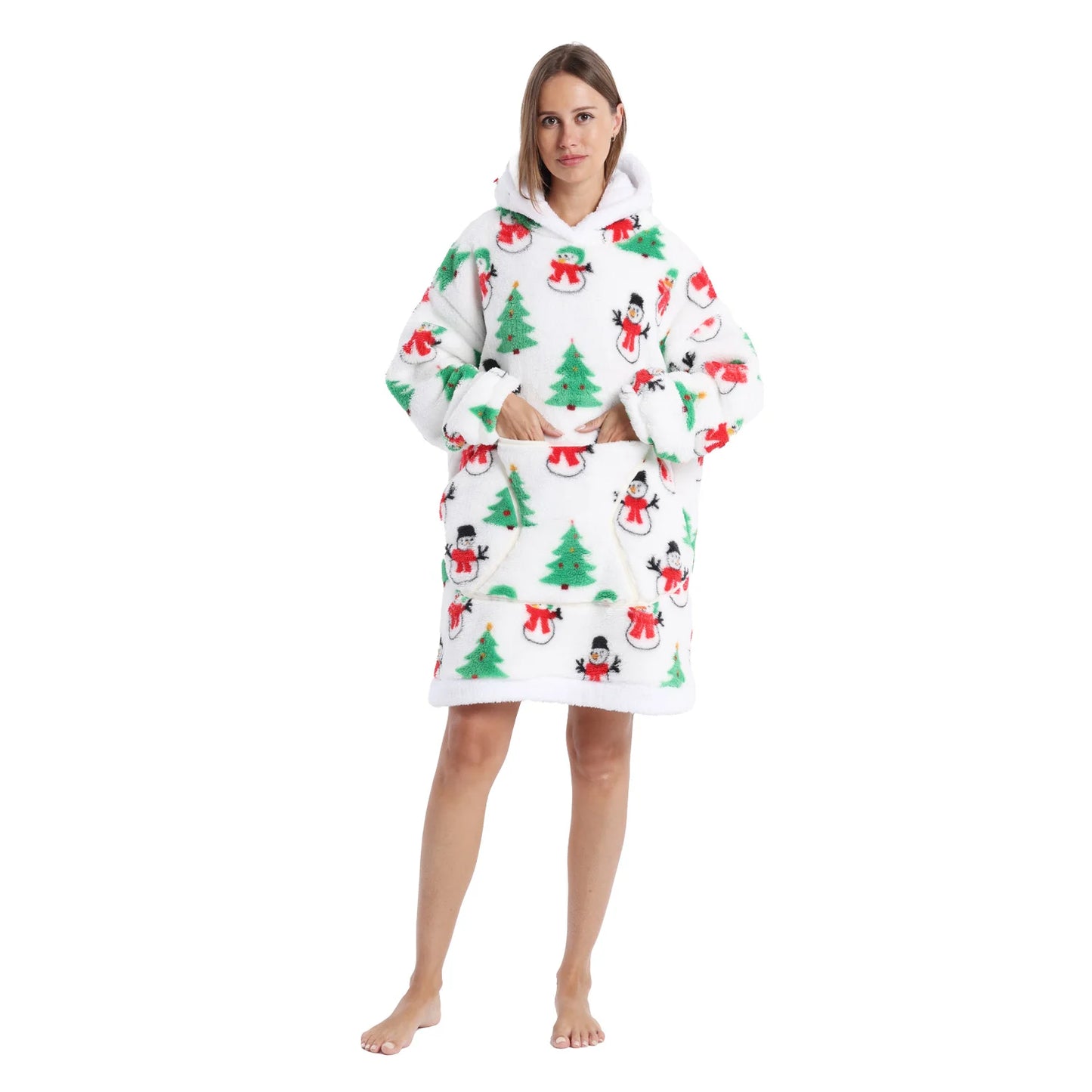 Woman wearing a white oversized Christmas themed hoodie with snowman and tree motifs