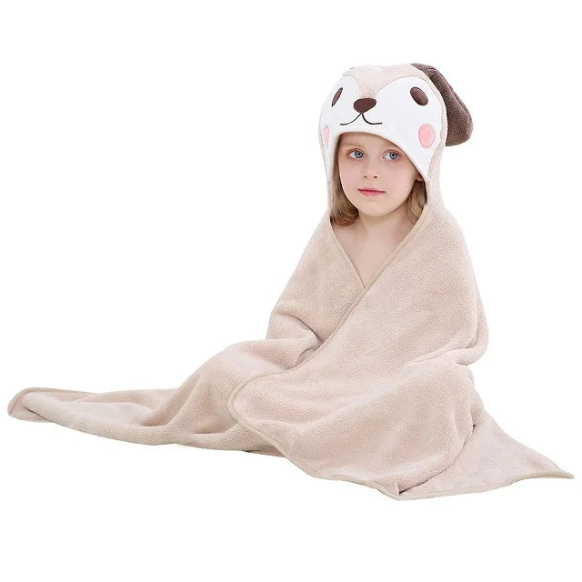 Child wearing a brown dog hooded towel on a white background