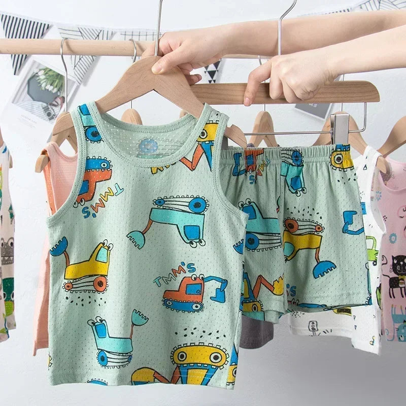 Green vest and shorts pyjama set with construction vehicles print