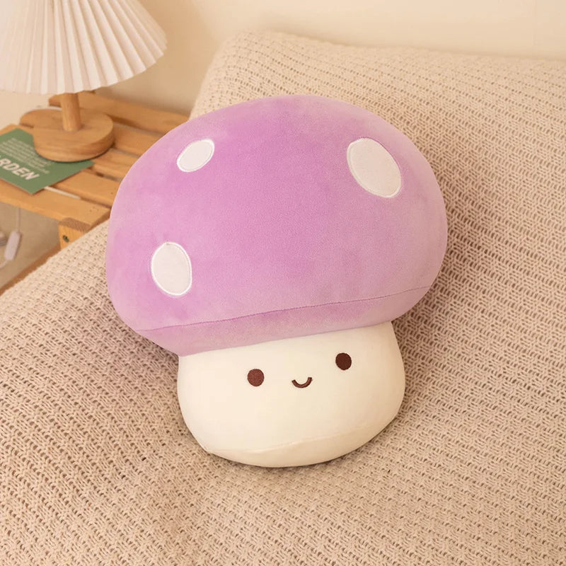 Purple soft plush mushroom toy on a soft surface.